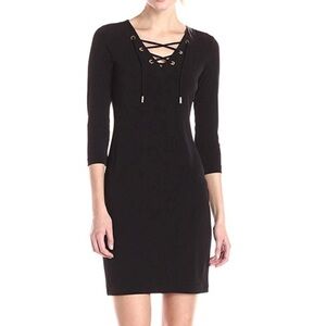 Black Calvin Klein V-neck lace up/gold accent